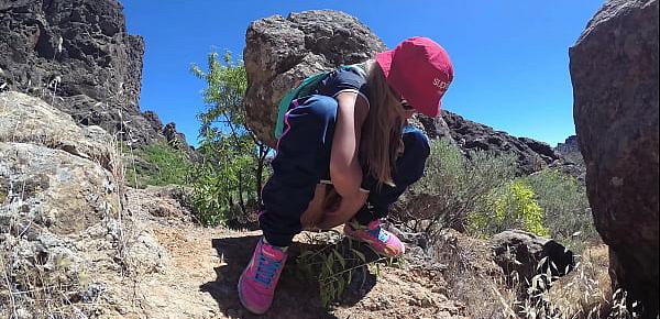  PISS PISS TRAVEL - Young girl tourist peeing in the mountains Gran Canaria. Public Canarias